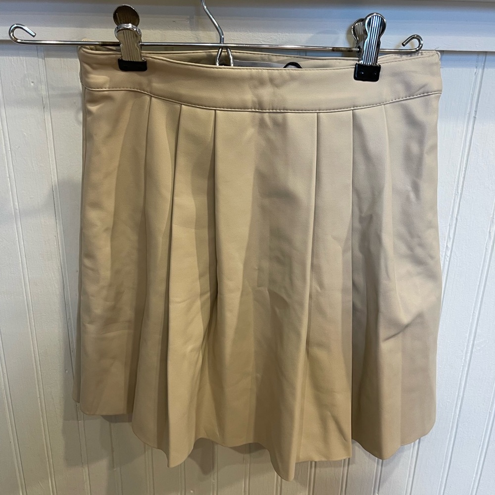 Light beige cream faux leather skirt.